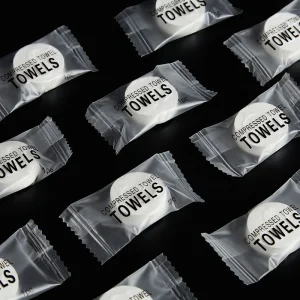 Manufacturer High Quality Travel Portable Candy shaped 100Pcs Pack Pure Cotton Compressed Disposable Face Towel