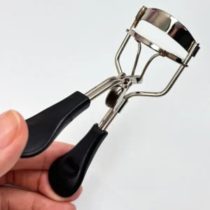 Silver Professional Eyelash Curler Black Handle Carbon Steel Construction Mini Manual Tool for Long Lasting Curl Ergonomic