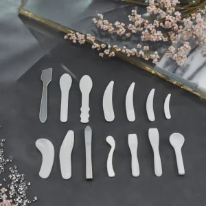 Stock Set of Cosmetic Spatulas Facial Spoon Different Types for Skin Care Made of PP Materials